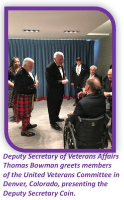 Deputy Secretary of Veterans Affairs Thomas Bowman greets members of the United Veterans Committee in Denver, Colorado