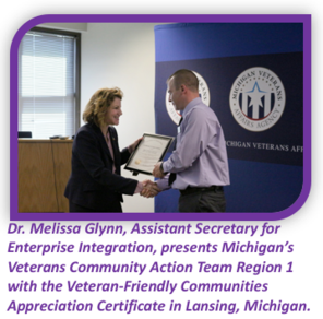 Dr. Melissa Glynn presents Michigan’s Veterans Community Action Team Appreciation Certificate in Lansing, Michigan