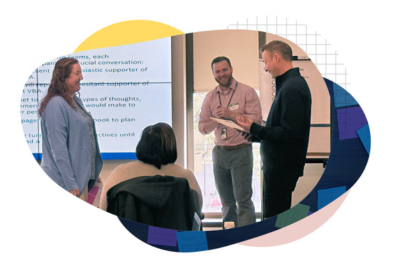 VACXi instructor listens to CXEL participants share their ideas to improve CX