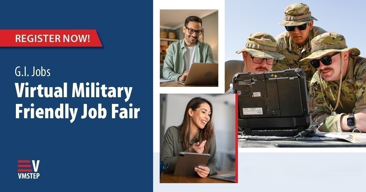Military members looking at a laptop