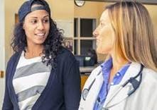 Woman Veteran talking to her doctor