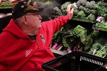 Veteran buying healthy food at the store