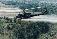 Helicopter spraying in the air