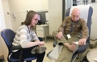 A Veteran having a foot exam