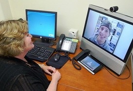 A Veteran talking to his doctor via VA Telehealth