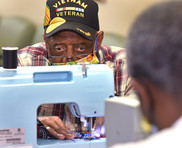 Veteran making a mask