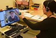 A Veteran and his doctor using VA Video Connect 