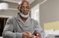 A Veteran viewing self-care tools on the COVID Coach app