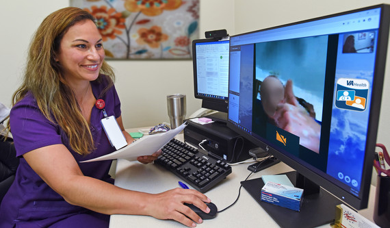 Imaging tech talking to patient via video