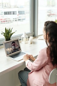 Woman on laptop on video call