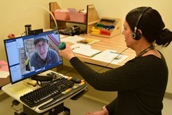 A Veteran talking to a provider via video