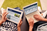 Veterans reviewing the newsletter and the online portal