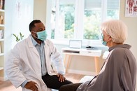 A Veteran talking with his doctor