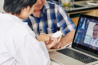 A Veteran discussing PTSD medication options via VA Video Connect 