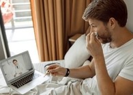 Veteran reviewing COVID-19 information online