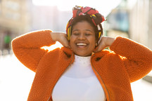 Black woman smiling and enjoying her day