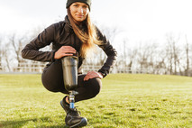 Woman runner with prosthetic limb