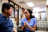A VA care provider talking to a Veteran about colon cancer