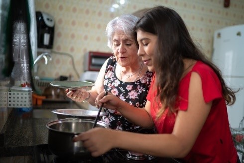 A Veteran and her granddaughter making soup