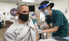 A Veteran receiving a COVID-19 vaccine