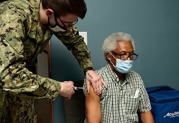A Veteran getting a COVID-19 Vaccine
