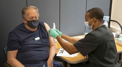 veteran receiving COVID vaccinnation 