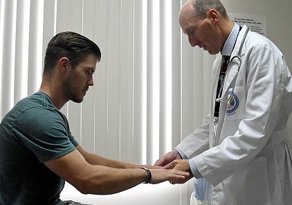 A Veteran meeting with his pain specialist 