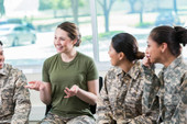 Women Veterans sitting and talking