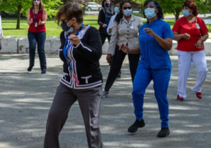 A group of Veterans exercising outside 
