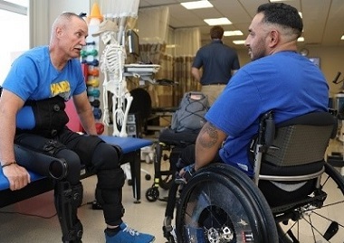 Two Veterans talking about pain and TBI's at a VA medical center