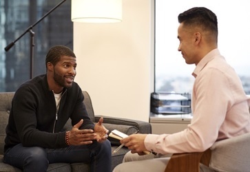 A Veteran talking to a mental health care professional at VA