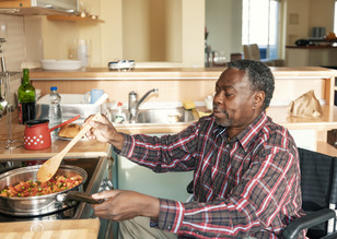 A Veteran cooking a low-carb meal 