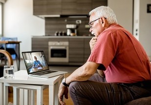 A Veteran talking to his doctor about PTSD treatment 