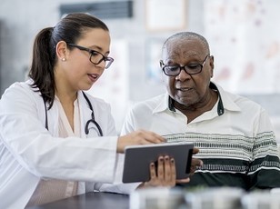 A Veteran meeting with his doctor to talk about memory problems