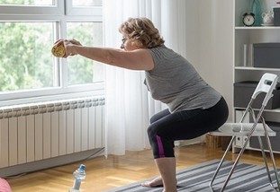 A Veteran exercising at home
