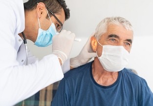 A Veteran having an ear exam