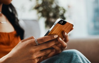 hands holding a mobile phone