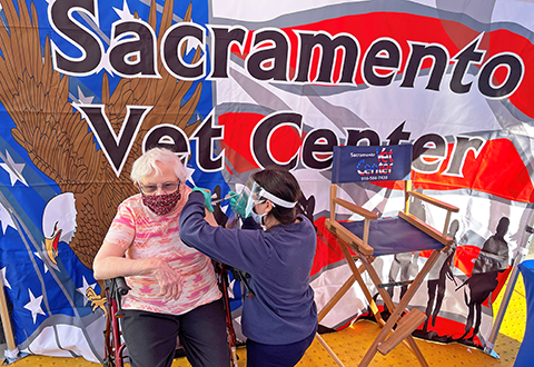 woman receives a vaccine
