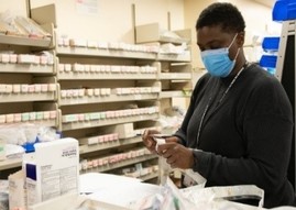 A VA Pharmacist sorting prescriptions 