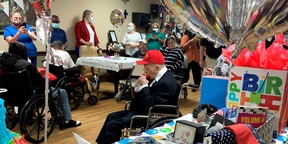 Veteran at his birthday party with friends and family