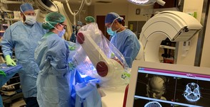 Surgeons in operating room using new surgical device