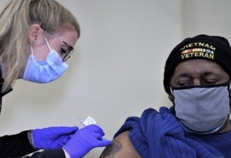 A Veteran receiving his COVID-19 booster