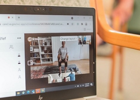 A Veteran using VA Video Connect for physical therapy