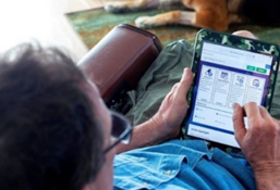 A man views My HealtheVet on a tablet