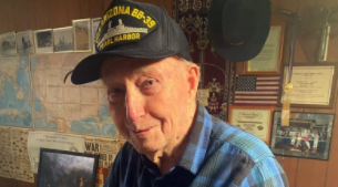 Older man wearing baseball cap