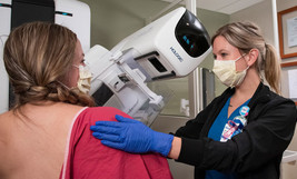 Woman gets a mammogram in clinic