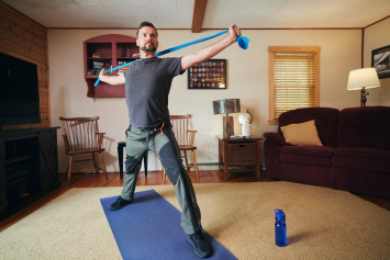 A Veteran practices yoga as part of his fitness plan.