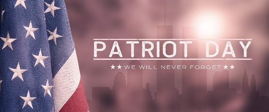 Banner-style graphic of US flag and NYC city line with twin towers in the background