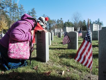 Widow at the grave of a veteran