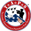 TAPS logo is round with a red border. Two hands are holding a folded American flag and a silhouette is playing the trumpet while airplanes fly by